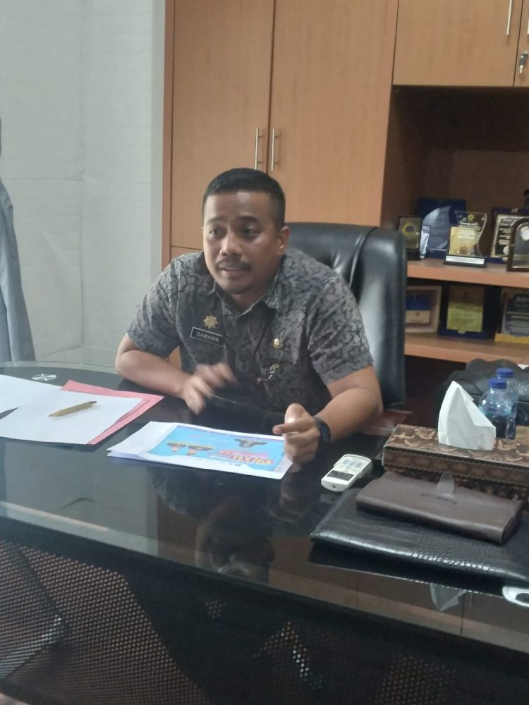 Kadis pariwisata Kabupaten Simalungun M.Fikri Fanani Damanik saat memberikan keterangan di kantornya, Kamis (13/7/2023).(Nawasenanews/Ist)