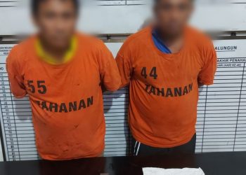 Dua pengedar Narkoba jenis Sabu sabu dan ganja, DR dan O yang berhasil ditangkap Polsek Parapat Pokres Simalungun di Girsang Sipangan Bolon. ( Nawasenanews/Ist)
