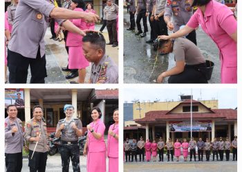 Keterangan Foto : Kapolres Pematang Siantar AKBP Yogen Heroes Baruno SH, SIK, saat Upacara Kenaikan Pangkat dengan penyiraman air bunga.(Ist)