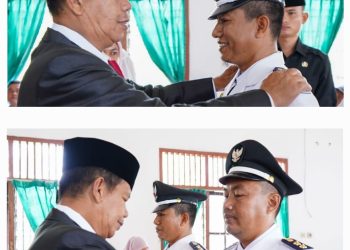 Keterangan Foto : Bupati Simalungun Radiapoh Hasiholan Sinaga saat melantik 2 Pangulu terpilih Muhammad Rijal sebagai pangulu Nagori Dolok Sinumbah Kecamatan Huta Bayu Raja dan Muhammad Nurdin sebagai pangulu Nagori Lingga Kecamatan Gunung Malela.(Ist)