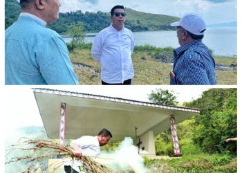 Keterangan Foto : Bupati Simalungun saat meninjau pelabuhan berdiskusi dengan masyarakat dan mengajak bergotong royong,serta menyempatkan membersihkan makam mantan Bupati Simalungun Djabanten Damanik yang menjabat sejak tahun 1990 hingga tahun 2000.(Ist)