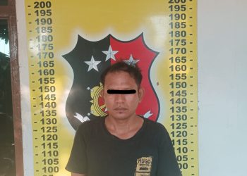 Tersangka HG alias Doyok yang berhasil diciduk Reskrim Polsek Perdagangan akibat melakukan praktik perjudian di salah satu warung kopi di Huta Ganjang.( Nawasenanews/ Ist)
